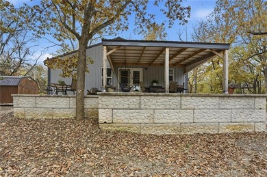 Price Improvement! Discover quiet lakefront living in this on Sugar Valley Lakes Golf Course in Kansas - for sale on GolfHomes.com, golf home, golf lot