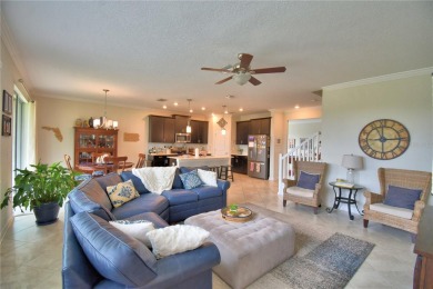 Located in the exclusive, gated community of ChampionsGate on The Oasis Club at Champions Gate in Florida - for sale on GolfHomes.com, golf home, golf lot