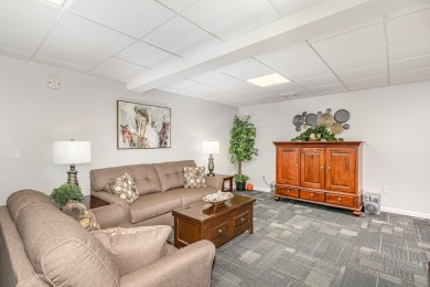 Lovely updated condo with full basement in the city of West on West Branch Country Club in Michigan - for sale on GolfHomes.com, golf home, golf lot