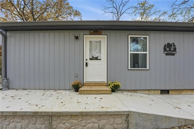 Price Improvement! Discover quiet lakefront living in this on Sugar Valley Lakes Golf Course in Kansas - for sale on GolfHomes.com, golf home, golf lot