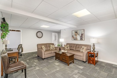 Lovely updated condo with full basement in the city of West on West Branch Country Club in Michigan - for sale on GolfHomes.com, golf home, golf lot