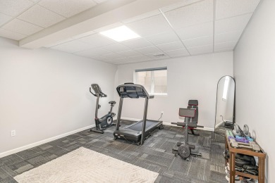Lovely updated condo with full basement in the city of West on West Branch Country Club in Michigan - for sale on GolfHomes.com, golf home, golf lot