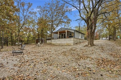 Price Improvement! Discover quiet lakefront living in this on Sugar Valley Lakes Golf Course in Kansas - for sale on GolfHomes.com, golf home, golf lot