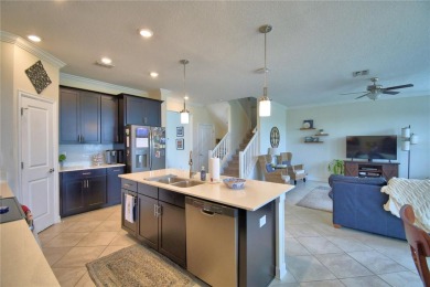 Located in the exclusive, gated community of ChampionsGate on The Oasis Club at Champions Gate in Florida - for sale on GolfHomes.com, golf home, golf lot