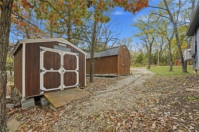 Price Improvement! Discover quiet lakefront living in this on Sugar Valley Lakes Golf Course in Kansas - for sale on GolfHomes.com, golf home, golf lot