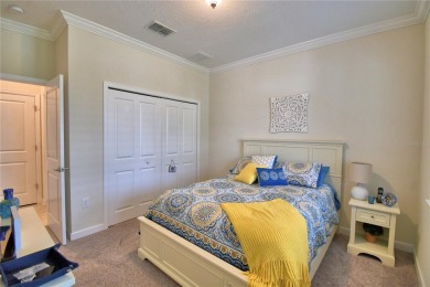 Located in the exclusive, gated community of ChampionsGate on The Oasis Club at Champions Gate in Florida - for sale on GolfHomes.com, golf home, golf lot