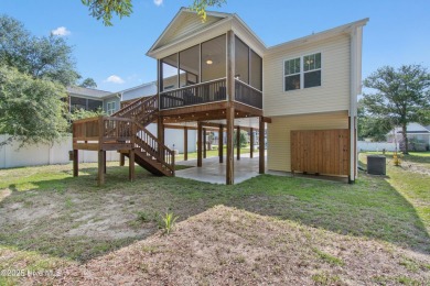 Welcome to 109 SW 17th Street, a beautiful home on pilings with on Founders Club At St. James Plantation in North Carolina - for sale on GolfHomes.com, golf home, golf lot