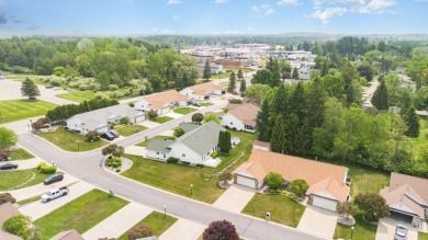 Lovely updated condo with full basement in the city of West on West Branch Country Club in Michigan - for sale on GolfHomes.com, golf home, golf lot