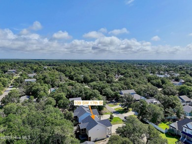 Welcome to 109 SW 17th Street, a beautiful home on pilings with on Founders Club At St. James Plantation in North Carolina - for sale on GolfHomes.com, golf home, golf lot