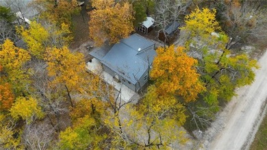 Price Improvement! Discover quiet lakefront living in this on Sugar Valley Lakes Golf Course in Kansas - for sale on GolfHomes.com, golf home, golf lot