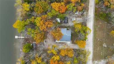 Price Improvement! Discover quiet lakefront living in this on Sugar Valley Lakes Golf Course in Kansas - for sale on GolfHomes.com, golf home, golf lot