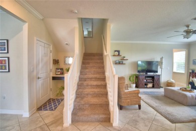 Located in the exclusive, gated community of ChampionsGate on The Oasis Club at Champions Gate in Florida - for sale on GolfHomes.com, golf home, golf lot
