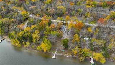 Price Improvement! Discover quiet lakefront living in this on Sugar Valley Lakes Golf Course in Kansas - for sale on GolfHomes.com, golf home, golf lot