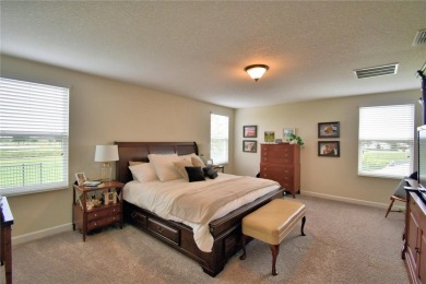 Located in the exclusive, gated community of ChampionsGate on The Oasis Club at Champions Gate in Florida - for sale on GolfHomes.com, golf home, golf lot