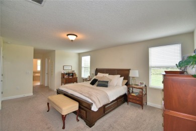 Located in the exclusive, gated community of ChampionsGate on The Oasis Club at Champions Gate in Florida - for sale on GolfHomes.com, golf home, golf lot