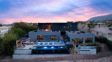 Pristine symmetrical landscaping paves your entrance into this on Bears Best Las Vegas Golf Club in Nevada - for sale on GolfHomes.com, golf home, golf lot