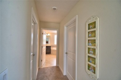 Located in the exclusive, gated community of ChampionsGate on The Oasis Club at Champions Gate in Florida - for sale on GolfHomes.com, golf home, golf lot