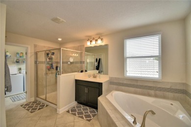 Located in the exclusive, gated community of ChampionsGate on The Oasis Club at Champions Gate in Florida - for sale on GolfHomes.com, golf home, golf lot