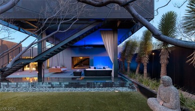 Pristine symmetrical landscaping paves your entrance into this on Bears Best Las Vegas Golf Club in Nevada - for sale on GolfHomes.com, golf home, golf lot