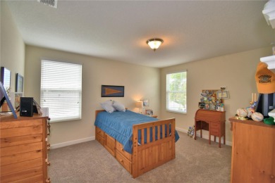 Located in the exclusive, gated community of ChampionsGate on The Oasis Club at Champions Gate in Florida - for sale on GolfHomes.com, golf home, golf lot