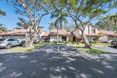 Furnished 2-bed, 2-bath waterfront villa in The Lakes of Deer on Deer Creek Golf Club in Florida - for sale on GolfHomes.com, golf home, golf lot