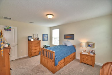 Located in the exclusive, gated community of ChampionsGate on The Oasis Club at Champions Gate in Florida - for sale on GolfHomes.com, golf home, golf lot