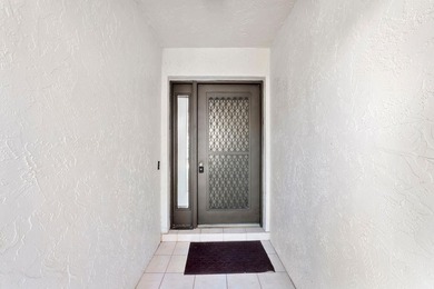 Furnished 2-bed, 2-bath waterfront villa in The Lakes of Deer on Deer Creek Golf Club in Florida - for sale on GolfHomes.com, golf home, golf lot