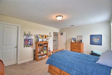 Located in the exclusive, gated community of ChampionsGate on The Oasis Club at Champions Gate in Florida - for sale on GolfHomes.com, golf home, golf lot