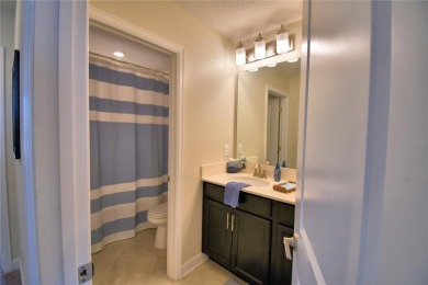 Located in the exclusive, gated community of ChampionsGate on The Oasis Club at Champions Gate in Florida - for sale on GolfHomes.com, golf home, golf lot