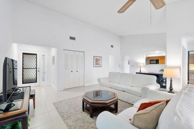 Furnished 2-bed, 2-bath waterfront villa in The Lakes of Deer on Deer Creek Golf Club in Florida - for sale on GolfHomes.com, golf home, golf lot