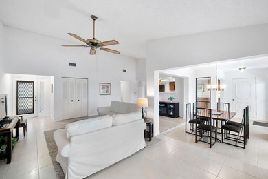 Furnished 2-bed, 2-bath waterfront villa in The Lakes of Deer on Deer Creek Golf Club in Florida - for sale on GolfHomes.com, golf home, golf lot