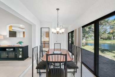 Furnished 2-bed, 2-bath waterfront villa in The Lakes of Deer on Deer Creek Golf Club in Florida - for sale on GolfHomes.com, golf home, golf lot