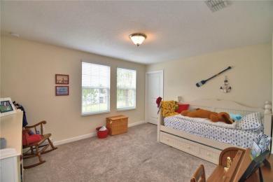 Located in the exclusive, gated community of ChampionsGate on The Oasis Club at Champions Gate in Florida - for sale on GolfHomes.com, golf home, golf lot