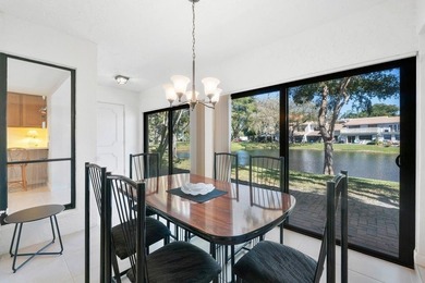 Furnished 2-bed, 2-bath waterfront villa in The Lakes of Deer on Deer Creek Golf Club in Florida - for sale on GolfHomes.com, golf home, golf lot