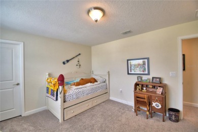 Located in the exclusive, gated community of ChampionsGate on The Oasis Club at Champions Gate in Florida - for sale on GolfHomes.com, golf home, golf lot