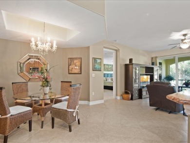 THIS BEAUTIFULLY APPOINTED THREE BEDROOM TWO BATH COACH HOME IS on Hammock Bay in Florida - for sale on GolfHomes.com, golf home, golf lot