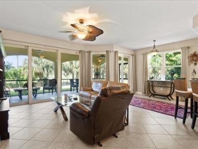 THIS BEAUTIFULLY APPOINTED THREE BEDROOM TWO BATH COACH HOME IS on Hammock Bay in Florida - for sale on GolfHomes.com, golf home, golf lot
