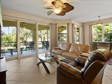 THIS BEAUTIFULLY APPOINTED THREE BEDROOM TWO BATH COACH HOME IS on Hammock Bay in Florida - for sale on GolfHomes.com, golf home, golf lot