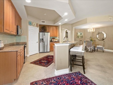 THIS BEAUTIFULLY APPOINTED THREE BEDROOM TWO BATH COACH HOME IS on Hammock Bay in Florida - for sale on GolfHomes.com, golf home, golf lot
