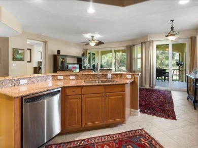 THIS BEAUTIFULLY APPOINTED THREE BEDROOM TWO BATH COACH HOME IS on Hammock Bay in Florida - for sale on GolfHomes.com, golf home, golf lot