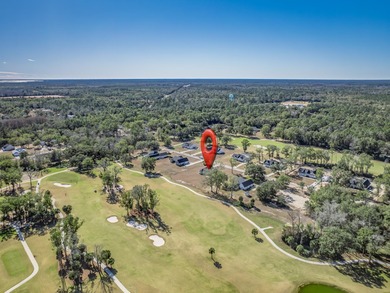 Move-in Ready! Exquisite new construction overlooking hole 6 of on Wildwood Country Club in Florida - for sale on GolfHomes.com, golf home, golf lot