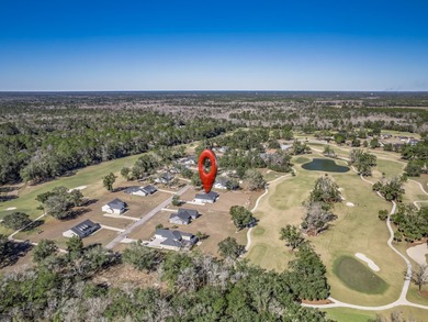 Move-in Ready! Exquisite new construction overlooking hole 6 of on Wildwood Country Club in Florida - for sale on GolfHomes.com, golf home, golf lot