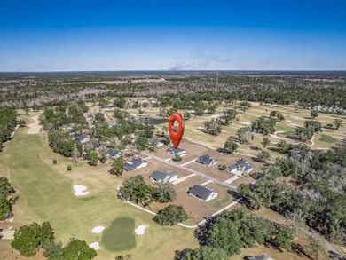 Move-in Ready! Exquisite new construction overlooking hole 6 of on Wildwood Country Club in Florida - for sale on GolfHomes.com, golf home, golf lot