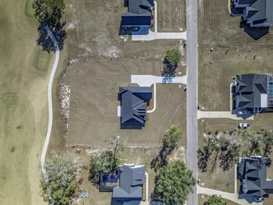 Move-in Ready! Exquisite new construction overlooking hole 6 of on Wildwood Country Club in Florida - for sale on GolfHomes.com, golf home, golf lot