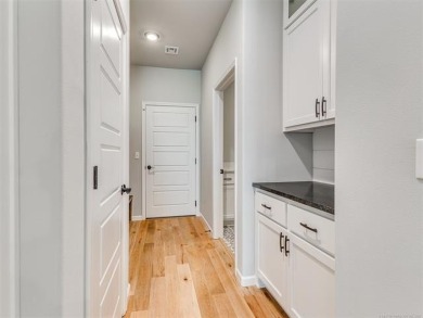 Step into effortless elegance with this better than new 3 year on Forest Ridge Golf Club in Oklahoma - for sale on GolfHomes.com, golf home, golf lot