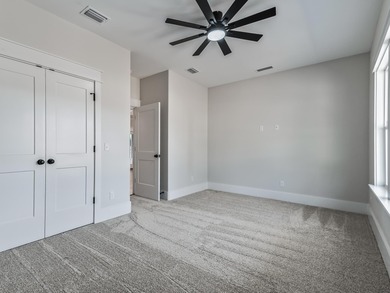 Move-in Ready! Exquisite new construction overlooking hole 6 of on Wildwood Country Club in Florida - for sale on GolfHomes.com, golf home, golf lot