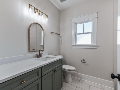 Move-in Ready! Exquisite new construction overlooking hole 6 of on Wildwood Country Club in Florida - for sale on GolfHomes.com, golf home, golf lot