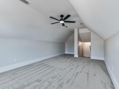 Move-in Ready! Exquisite new construction overlooking hole 6 of on Wildwood Country Club in Florida - for sale on GolfHomes.com, golf home, golf lot