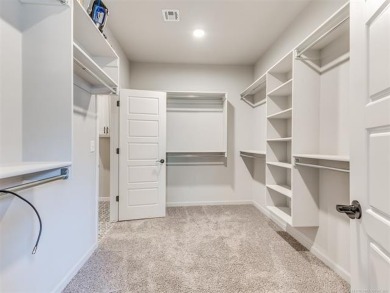 Step into effortless elegance with this better than new 3 year on Forest Ridge Golf Club in Oklahoma - for sale on GolfHomes.com, golf home, golf lot
