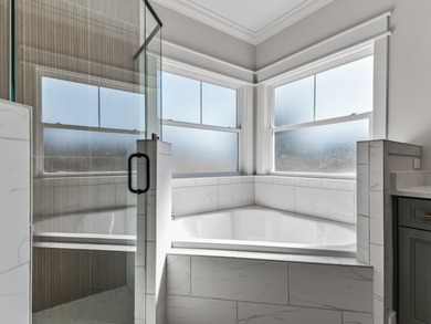 Move-in Ready! Exquisite new construction overlooking hole 6 of on Wildwood Country Club in Florida - for sale on GolfHomes.com, golf home, golf lot